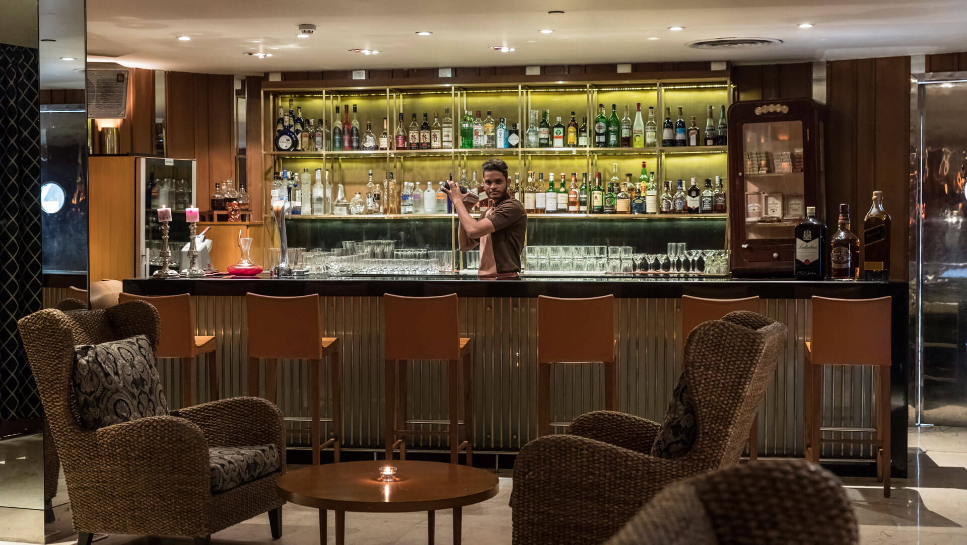 Interior of the bar with dining table set up at Dusk Navi Mumbai