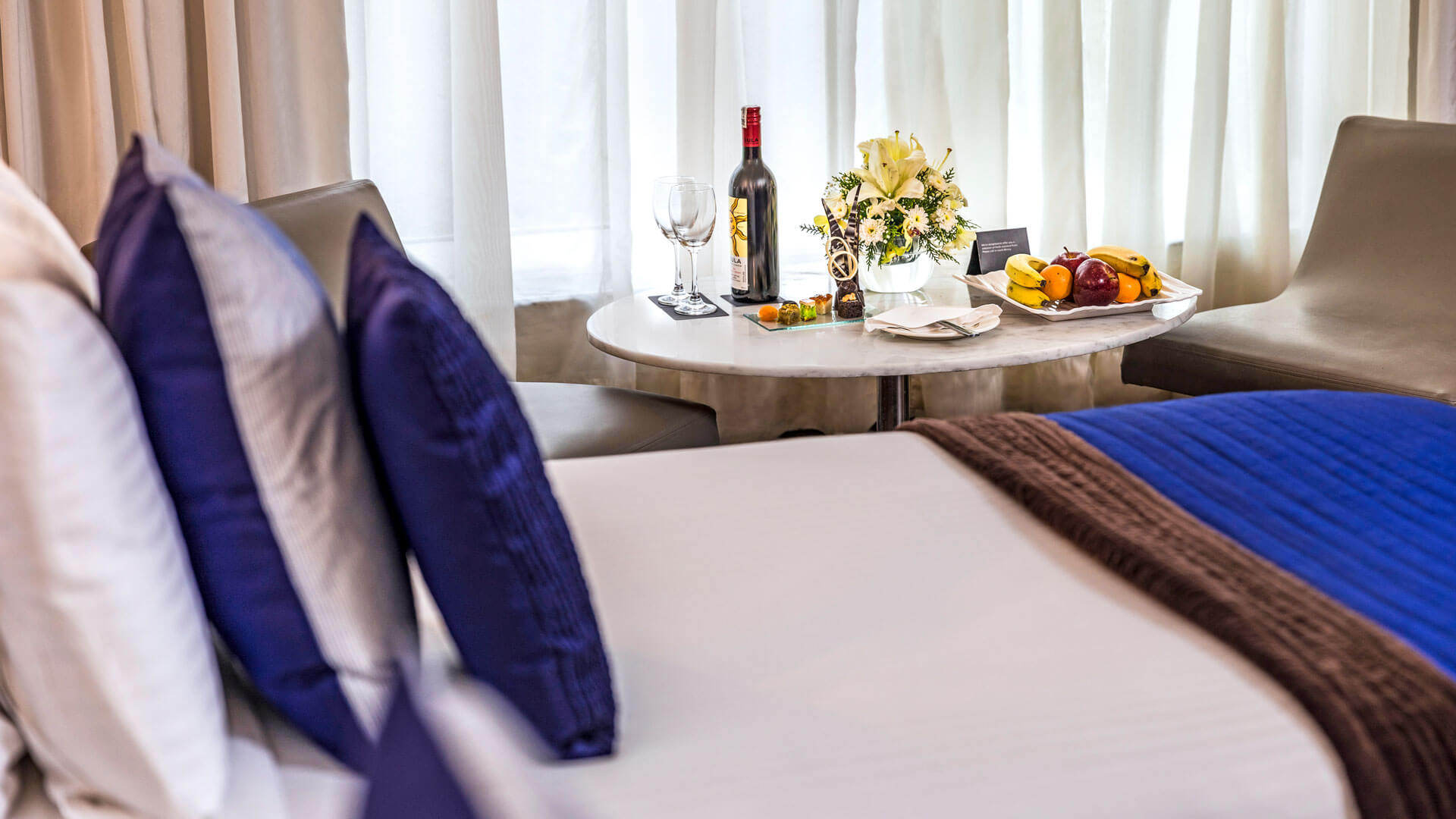 Fruit platter with Wine at Luxury Premium Rooms