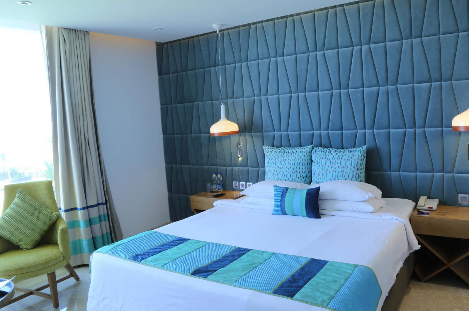 Queen size bed at Luxury Premium Rooms